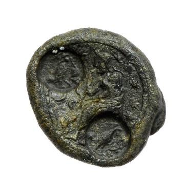 Ancient coin with engraved figures