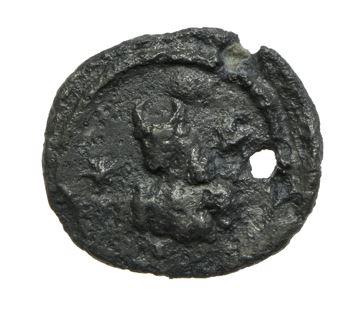Ancient coin with hole